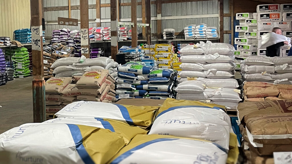 Rows of animal feed and farm supplies at the T+S Crop Services Middleport Location